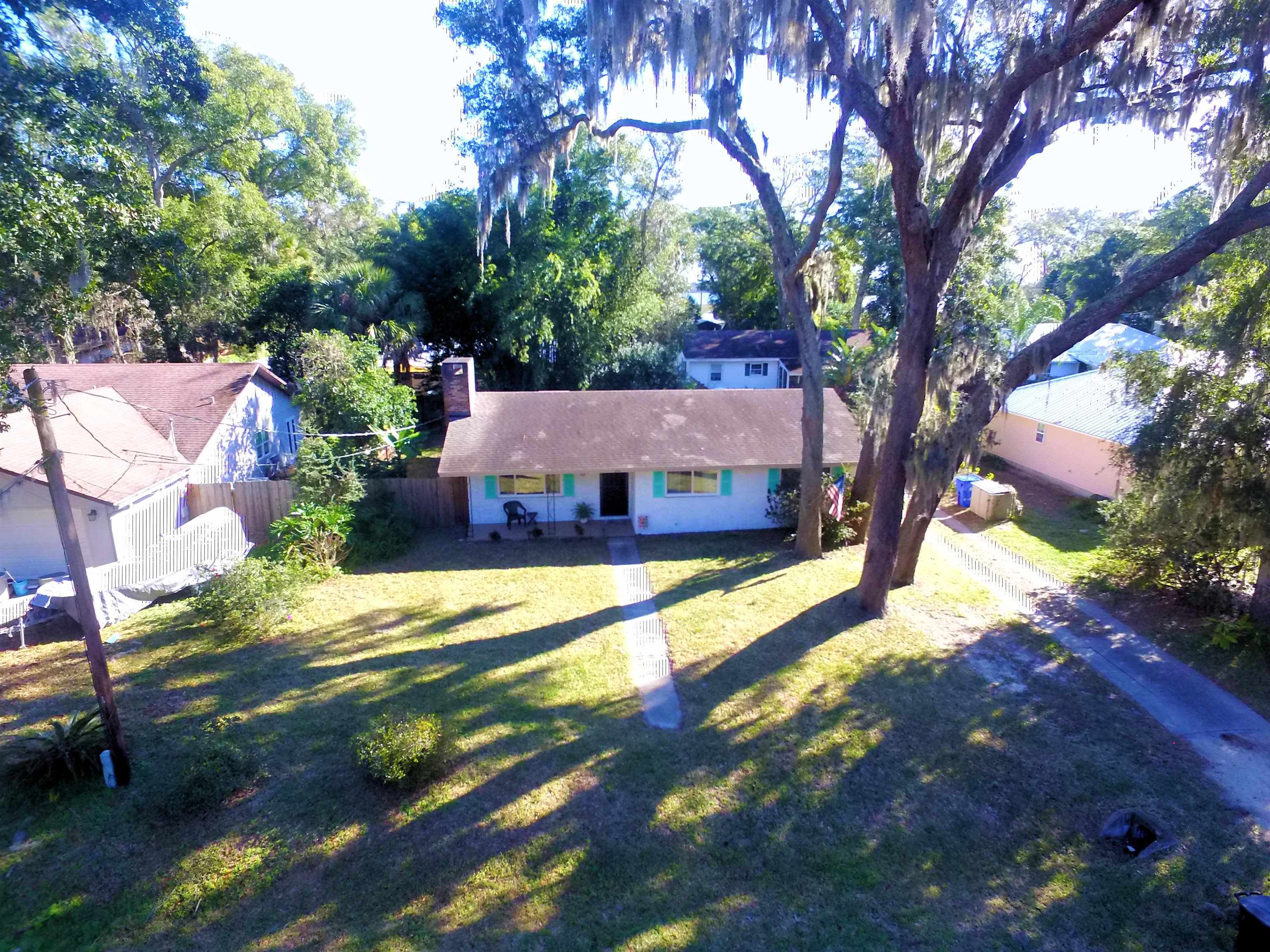 253 Mimosa Road St. Augustine, FL 32086 - Photo 3 of 42 a view of a house with a yard