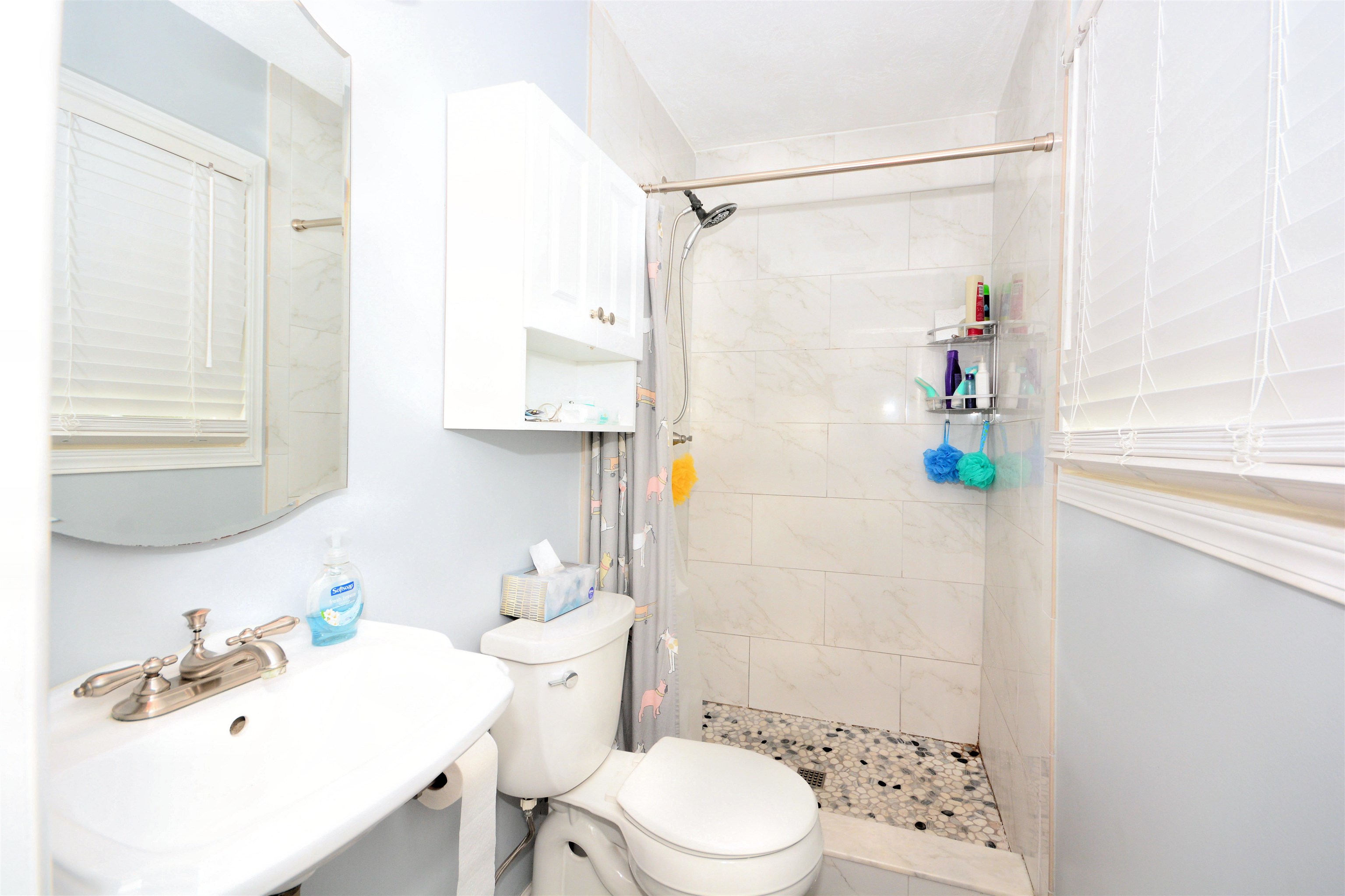 253 Mimosa Road St. Augustine, FL 32086 - Photo 32 of 42 a bathroom with a sink toilet and shower