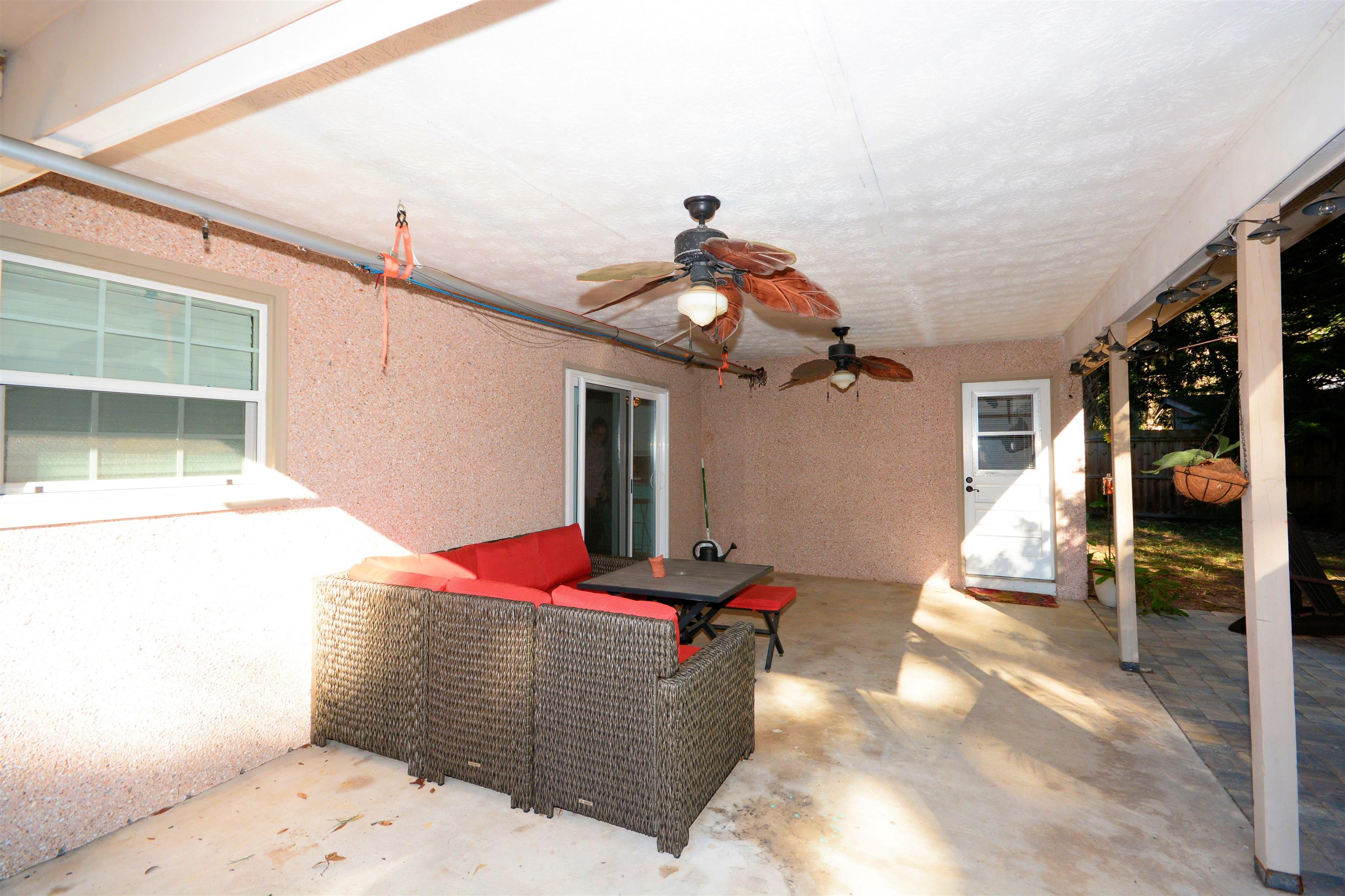 253 Mimosa Road St. Augustine, FL 32086 - Photo 36 of 42 a bedroom with a bed and a window