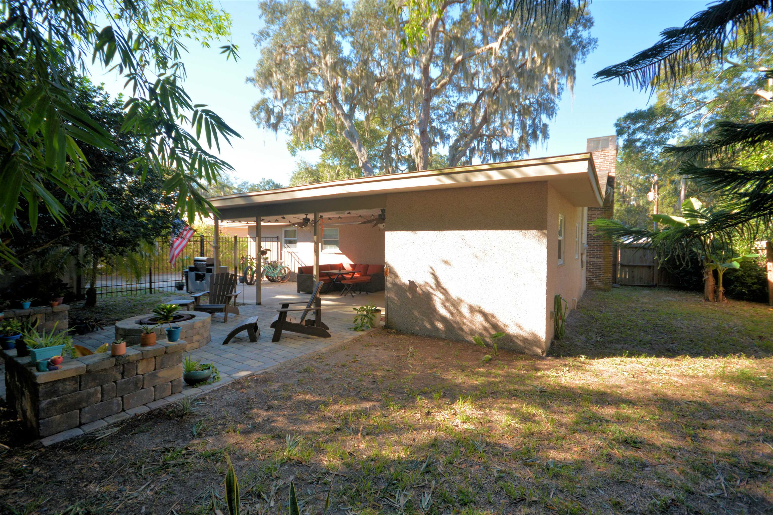 253 Mimosa Road St. Augustine, FL 32086 - Photo 38 of 42 a view of a backyard with sitting area