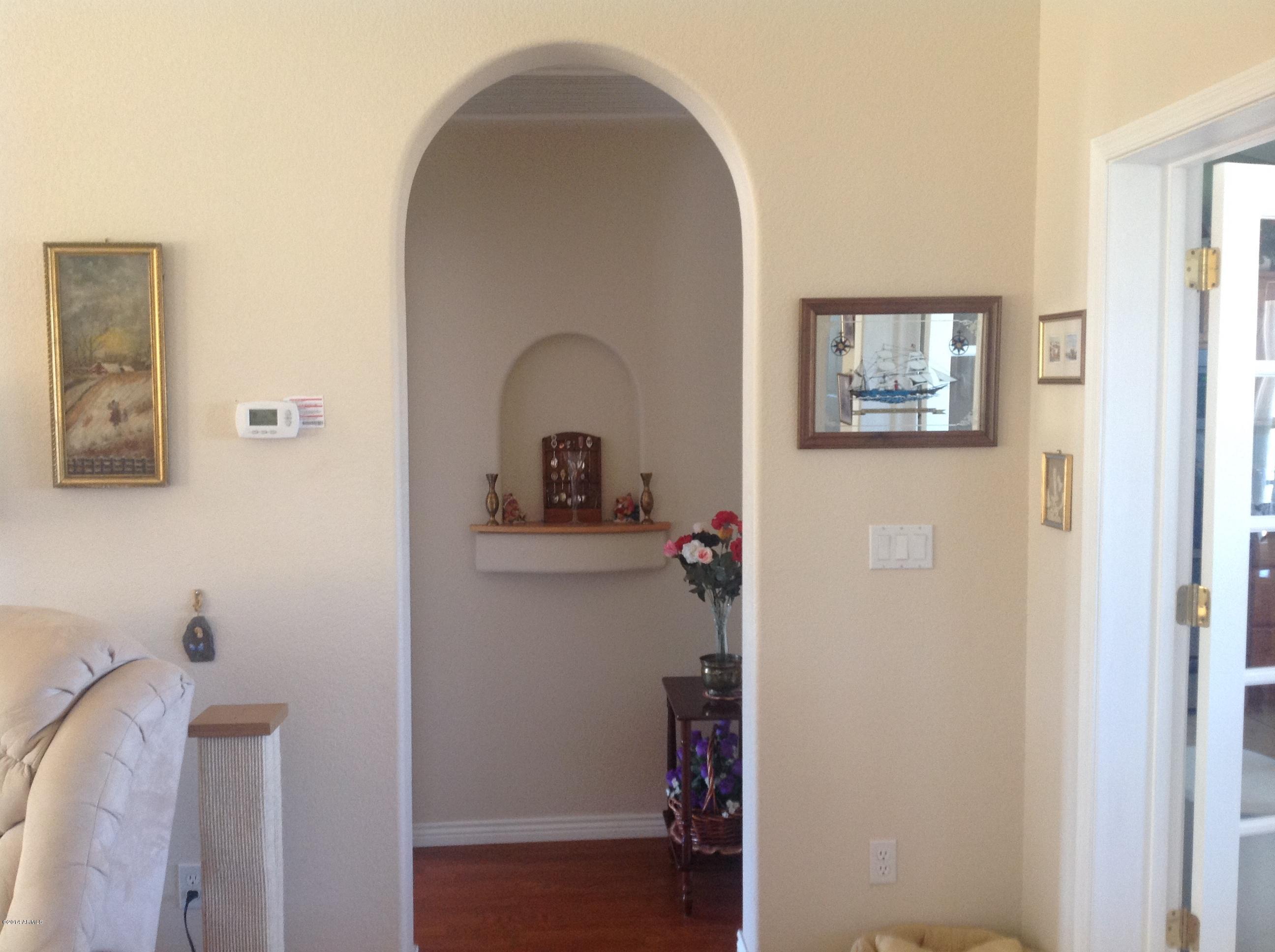 1355 North Acacia Road Apache Junction, AZ 85119 - Photo 29 of 45 a living room with furniture and a window