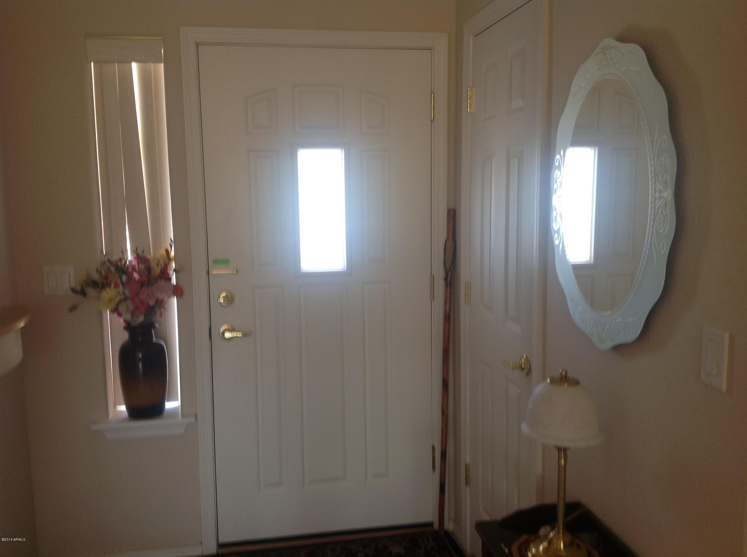 1355 North Acacia Road Apache Junction, AZ 85119 - Photo 33 of 45 a view of a bathroom with mirror and window