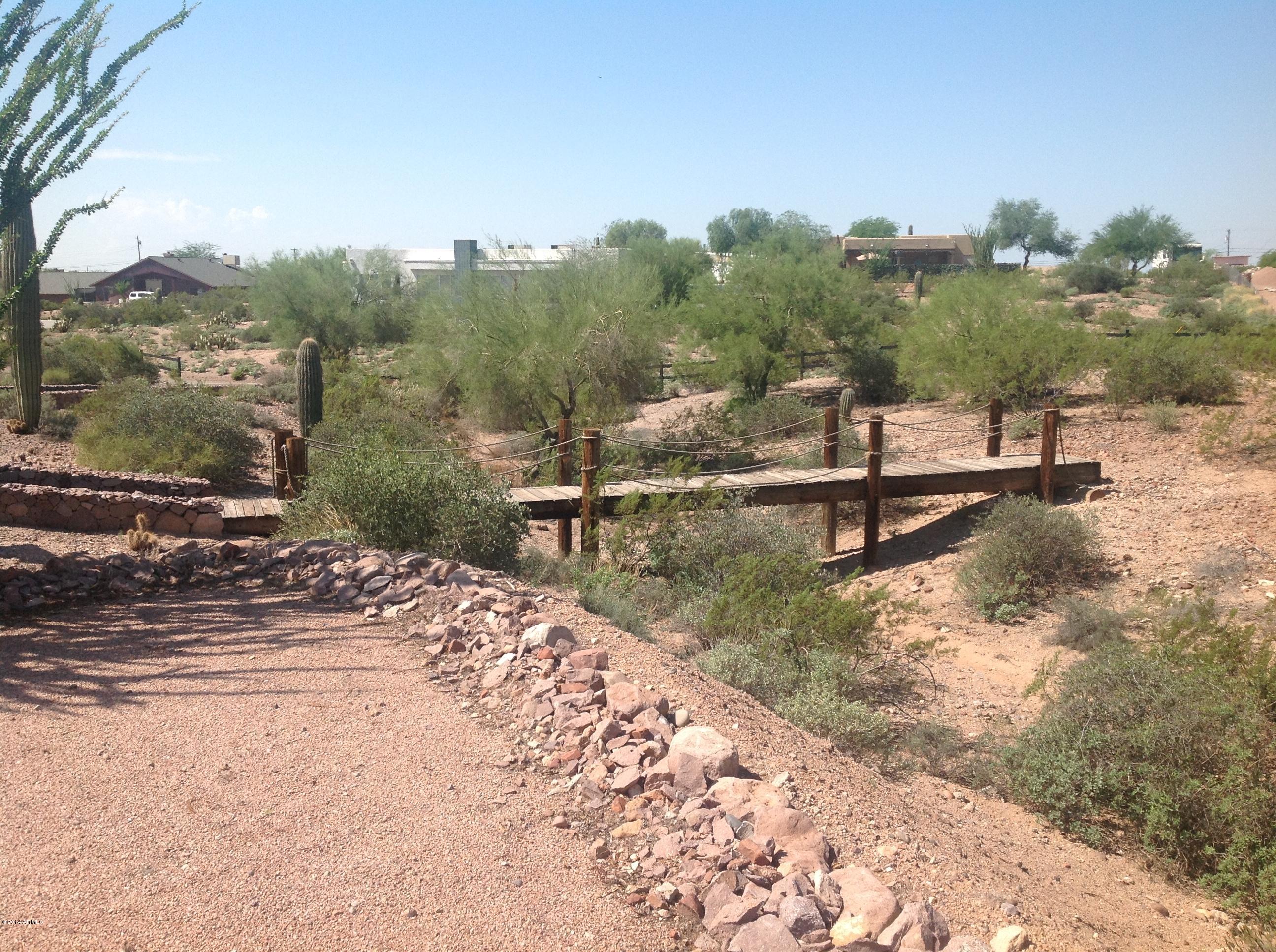 1355 North Acacia Road Apache Junction, AZ 85119 - Photo 45 of 45 a view of a lake with a mountain