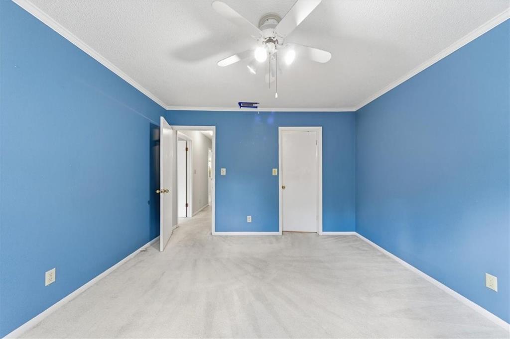 2260 Pernoshal Court Atlanta, GA 30338 - Photo 13 of 46 a view of a livingroom with a chandelier fan