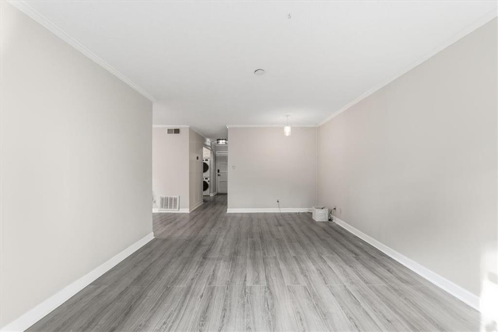 2260 Pernoshal Court Atlanta, GA 30338 - Photo 20 of 46 a view of a room with wooden floors and led lights