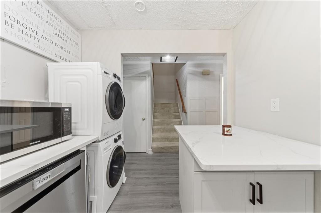 2260 Pernoshal Court Atlanta, GA 30338 - Photo 27 of 46 a utility room with dryer and washer