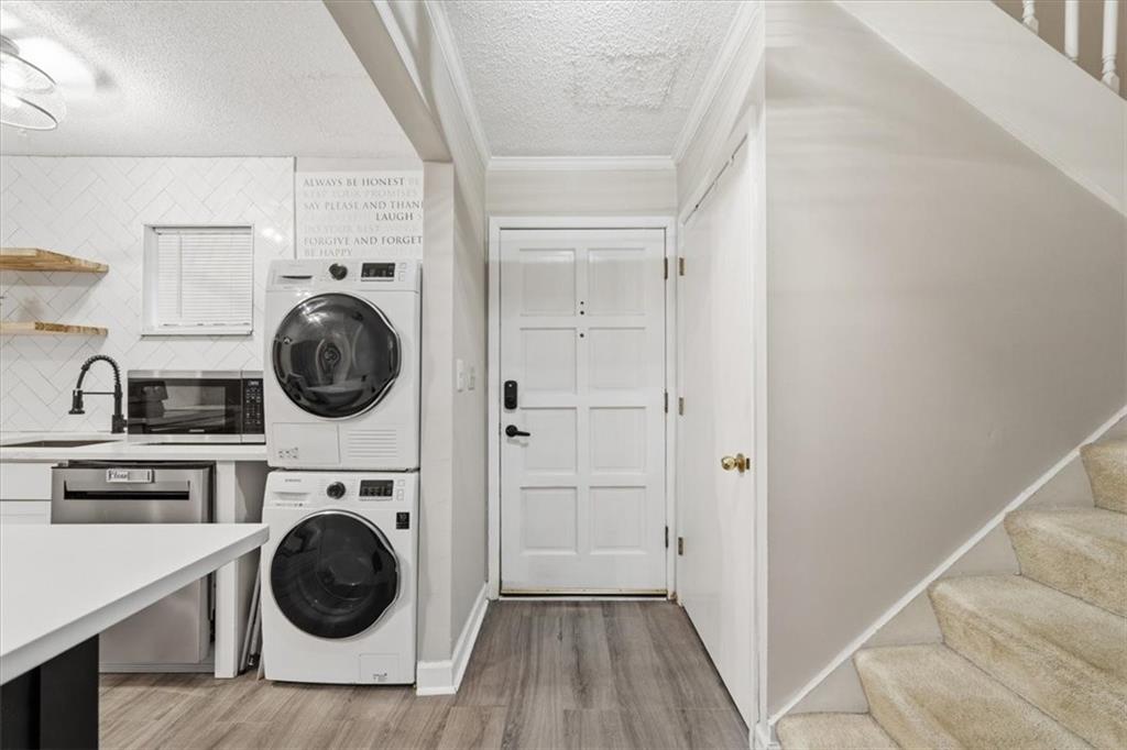 2260 Pernoshal Court Atlanta, GA 30338 - Photo 32 of 46 a view of a kitchen with washer and dryer