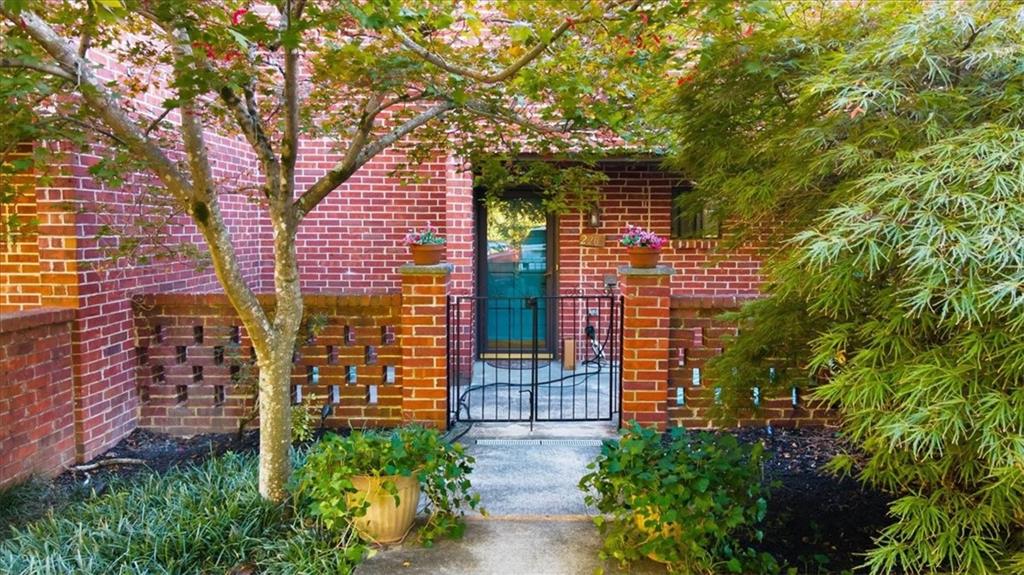 2260 Pernoshal Court Atlanta, GA 30338 - Photo 5 of 46 a view of a pathway both side of building