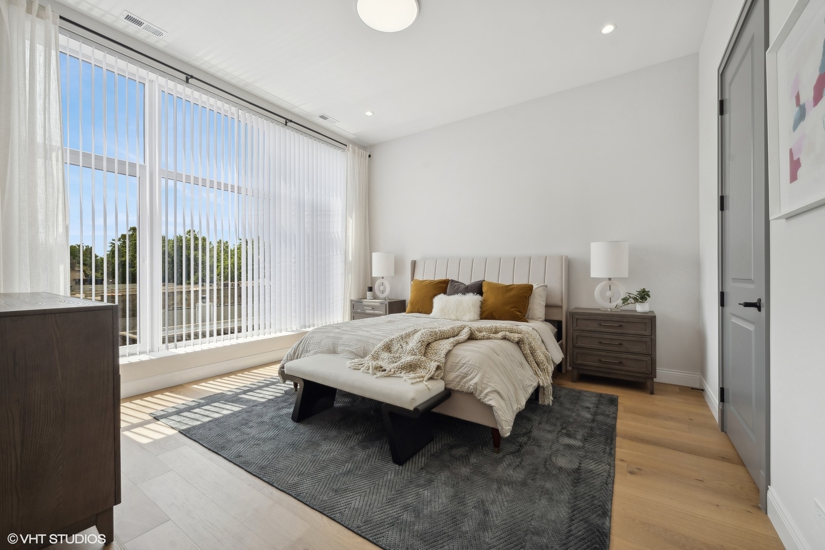 1615 West Irving Park Road, Unit 1S Chicago, IL 60613 - Photo 11 of 19 a spacious bedroom with a bed and a window