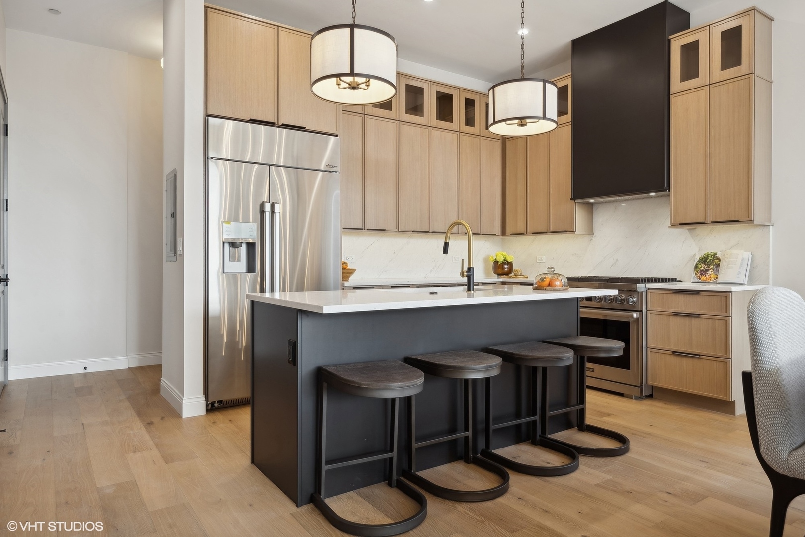 1615 West Irving Park Road, Unit 1S Chicago, IL 60613 - Photo 3 of 19 a kitchen with a sink appliances and cabinets