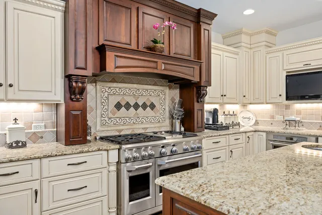 a kitchen that has a lot of counter top space