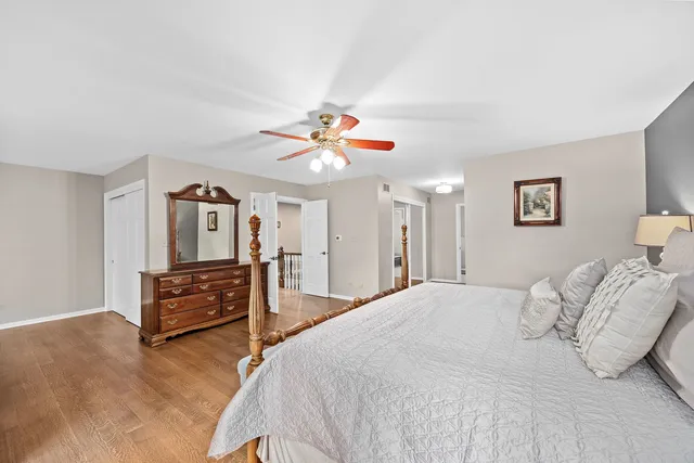 a large spacious bathroom with a granite countertop tub and a sink