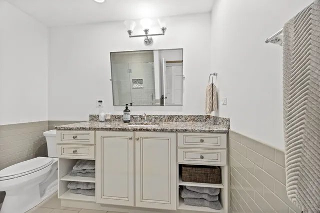 a living room with furniture pool table and a table