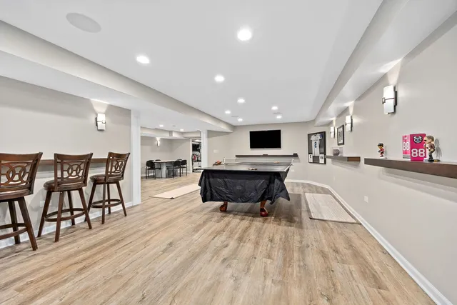 a view of kitchen with furniture and wooden floor