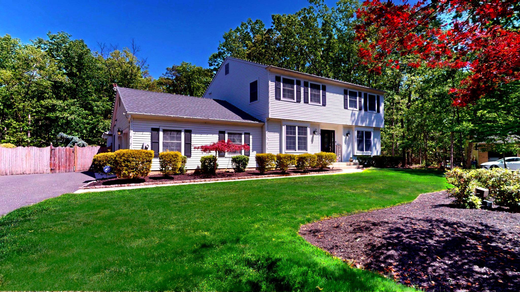 Charming home nestled in lush greenery.
