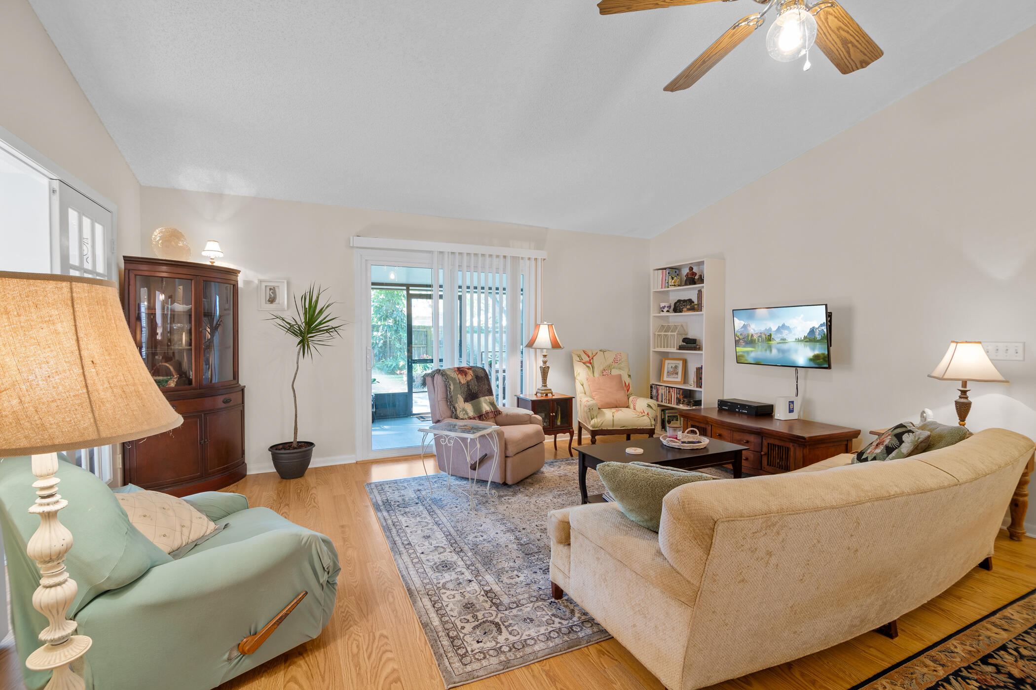 849 Gardener Road Rockledge, FL 32955 - Photo 9 of 31 a living room with furniture and a lamp