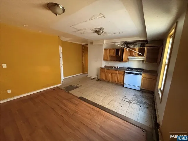a view of a refrigerator in a kitchen