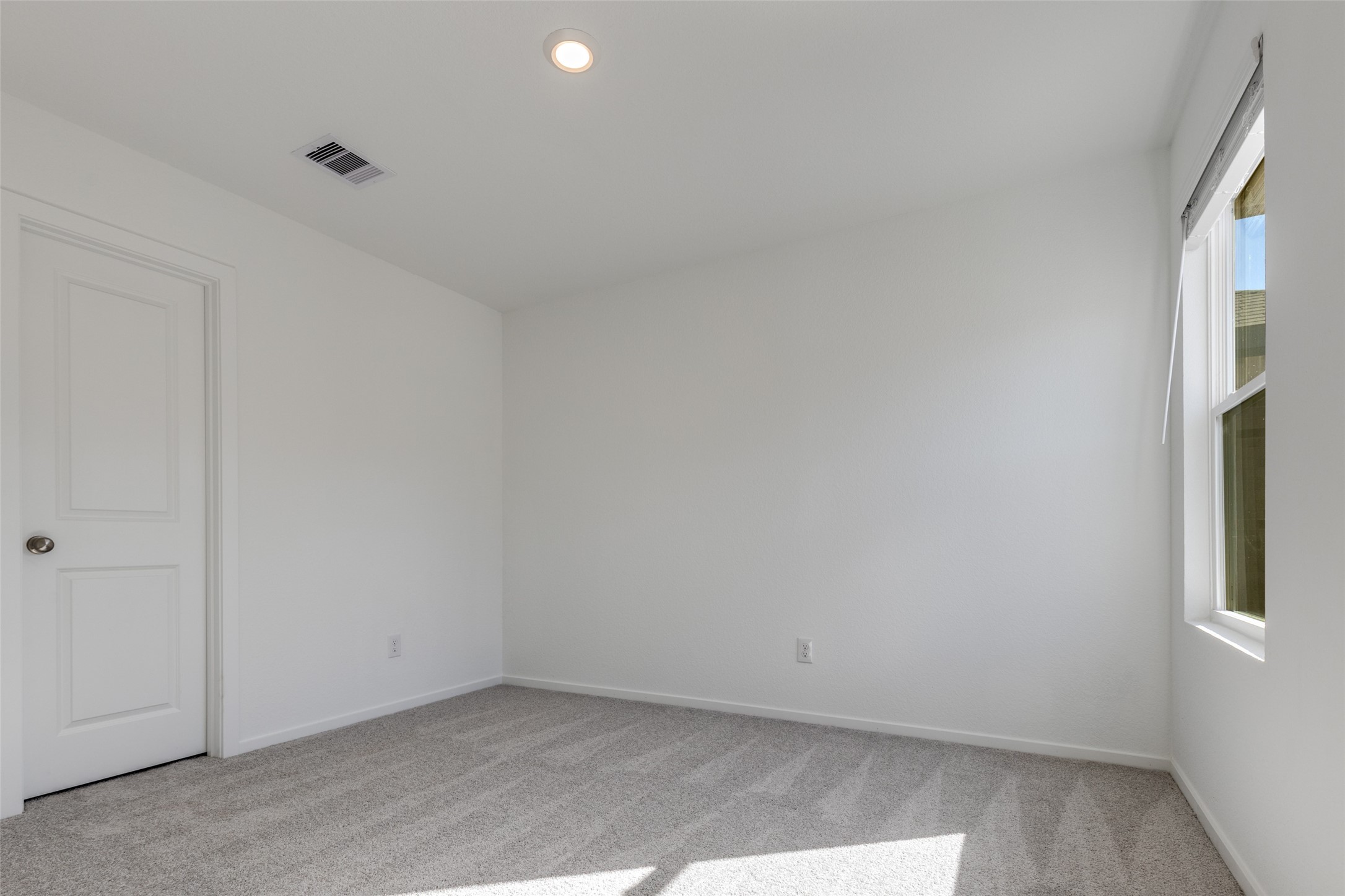 1528 Sunset Ridge Drive Conroe, TX 77303 - Photo 14 of 22 Second bedroom on the second floor.