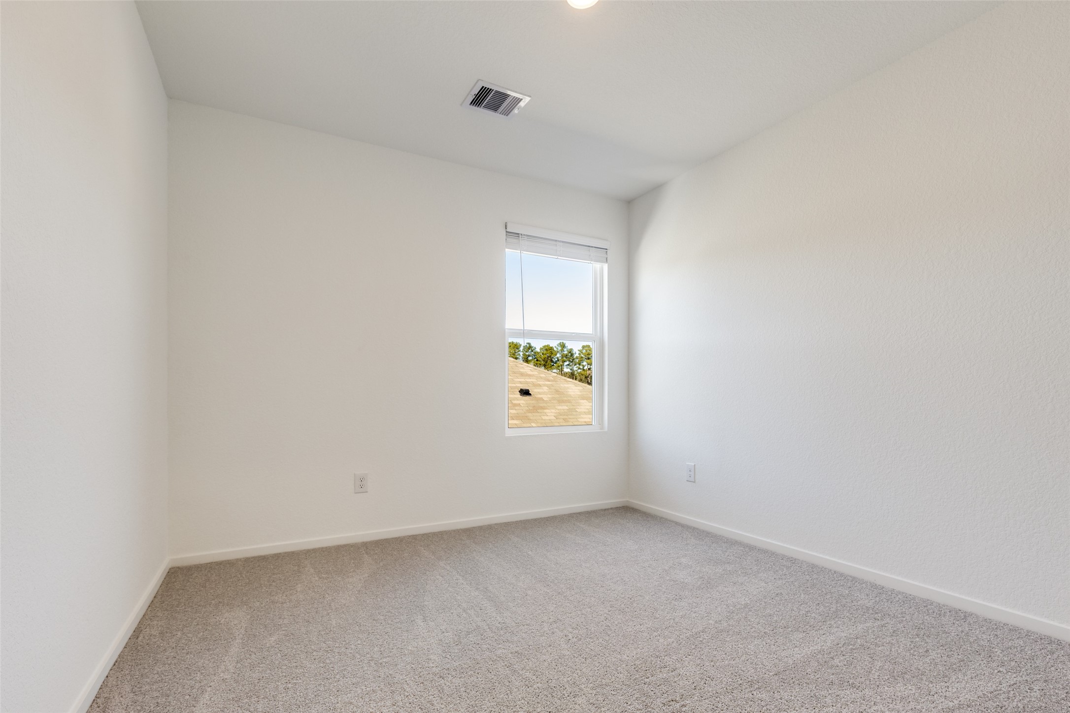 1528 Sunset Ridge Drive Conroe, TX 77303 - Photo 15 of 22 Third bedroom on the second floor.