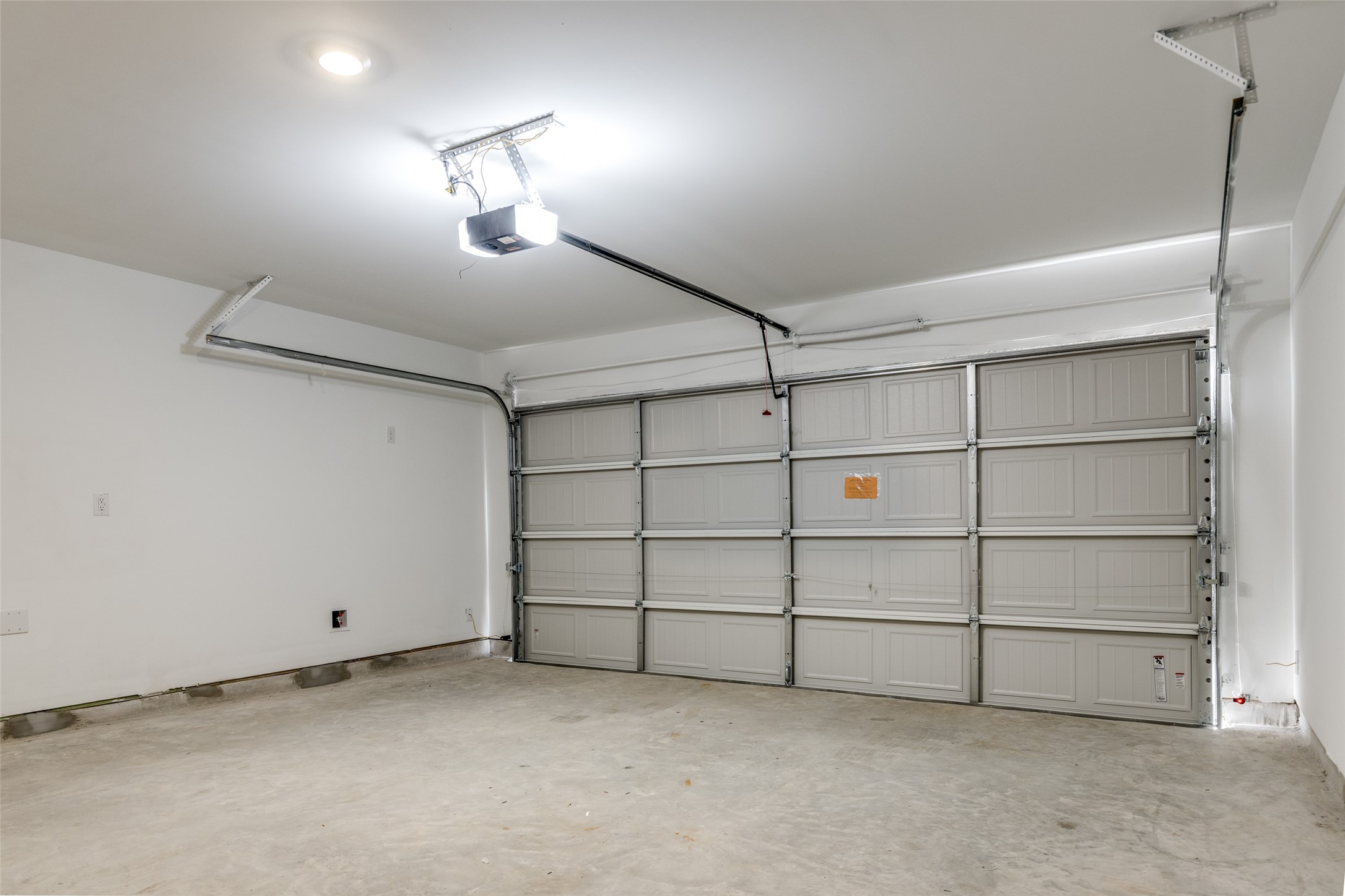 1528 Sunset Ridge Drive Conroe, TX 77303 - Photo 19 of 22 Spacious garage with automatic garage opener.