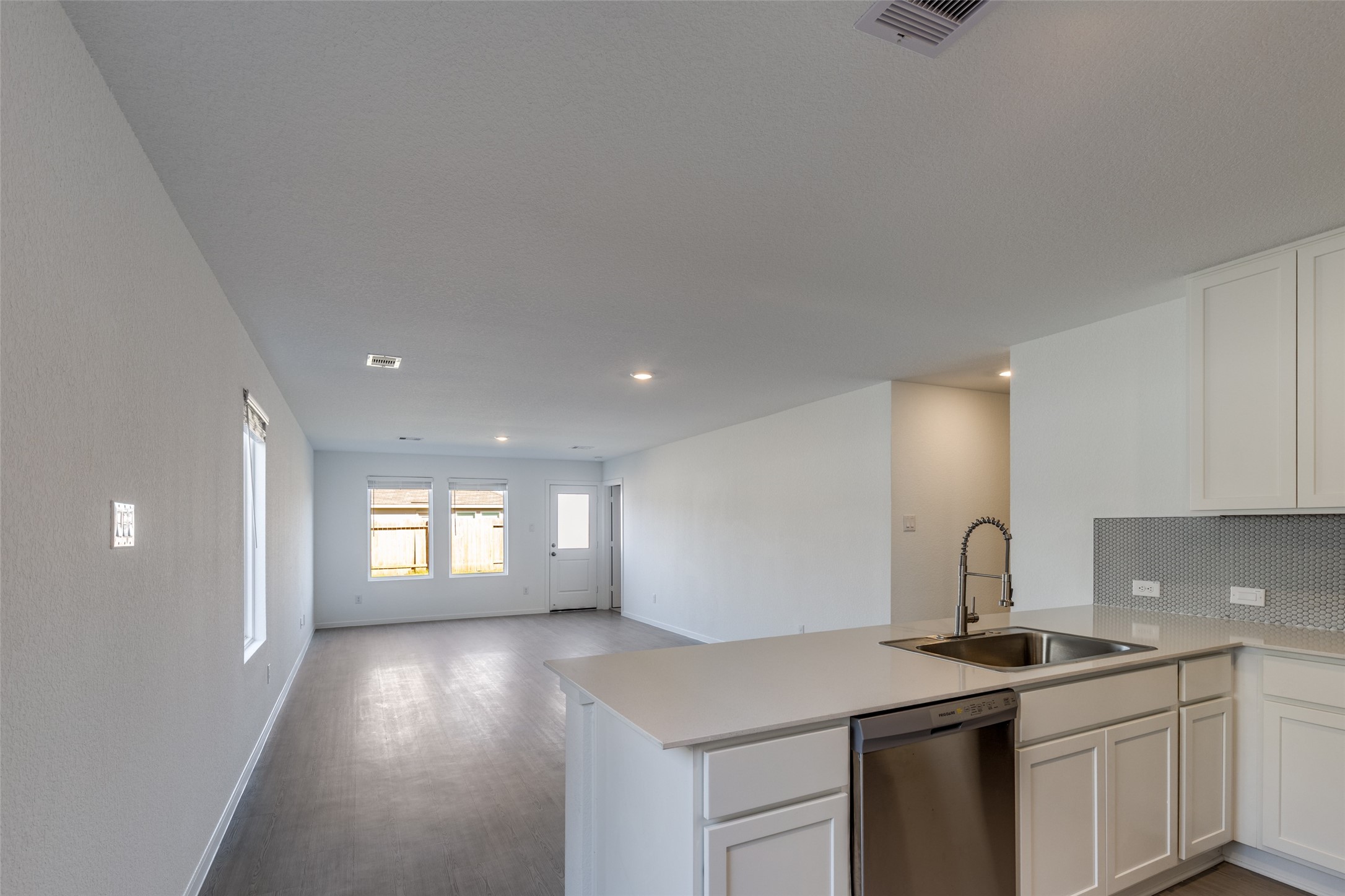 1528 Sunset Ridge Drive Conroe, TX 77303 - Photo 4 of 22 Open concept kitchen, dining, and living room. Perfect for hosting!