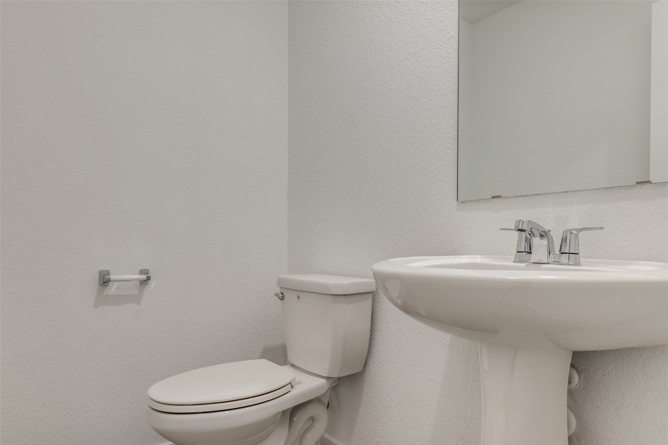 1528 Sunset Ridge Drive Conroe, TX 77303 - Photo 8 of 22 Half bathroom on the first floor.