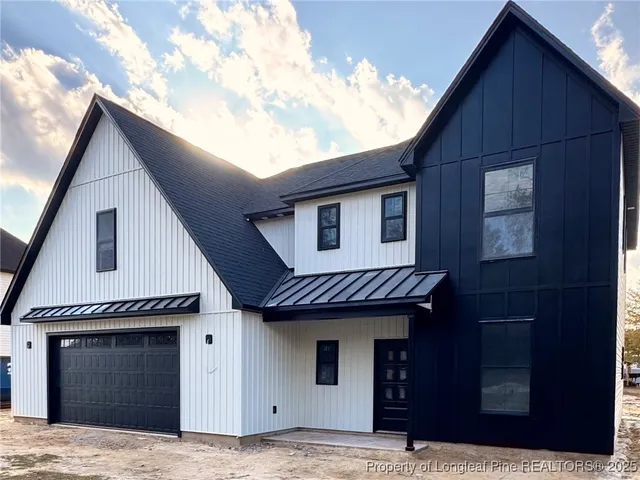 a house with trees in the background