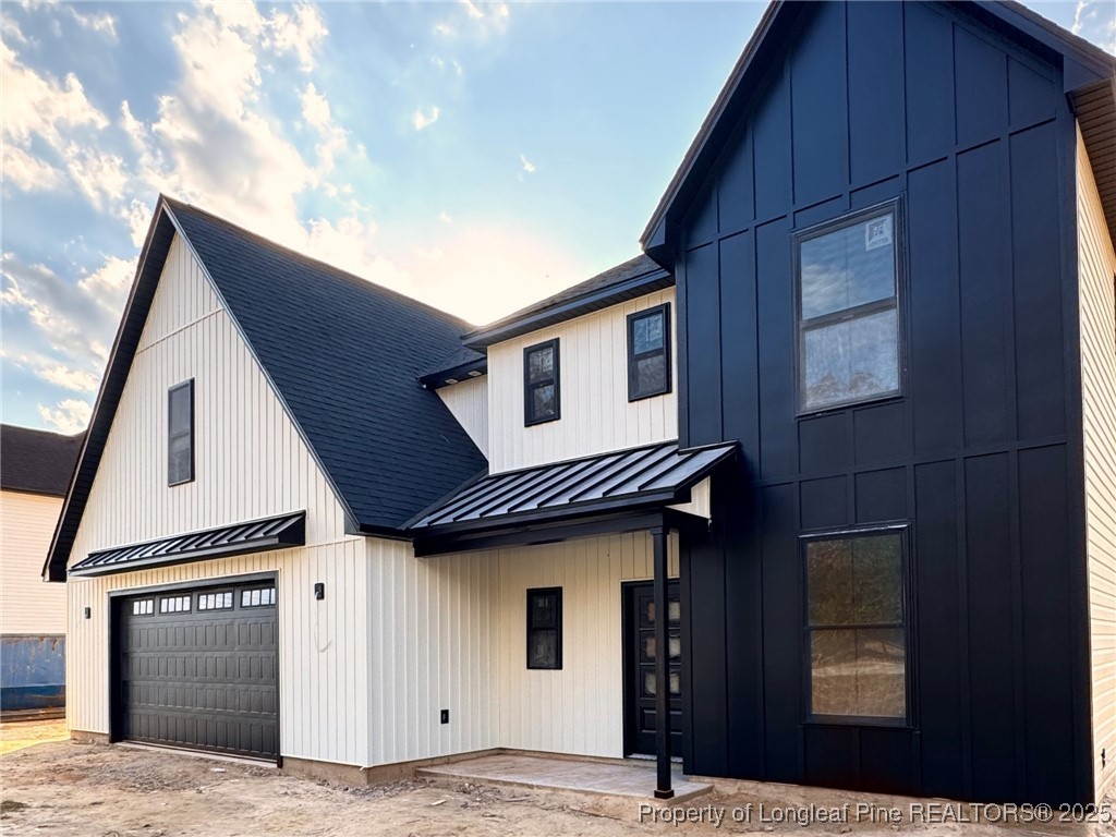 3546 Braddy Road Fayetteville, NC 28306 - Photo 4 of 5 a front view of a house with a garage