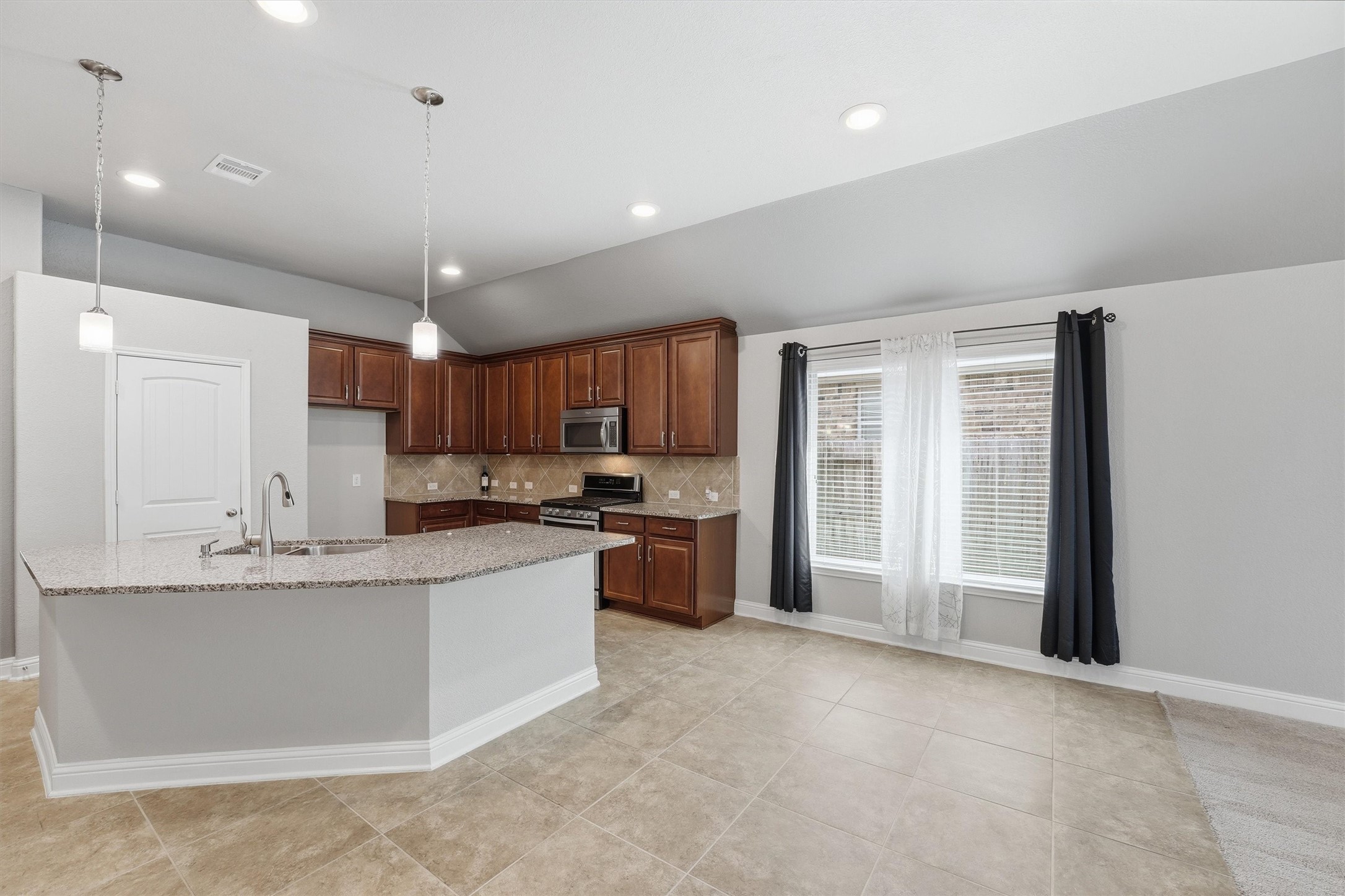 1911 Cedar Ridge Lane Pearland, TX 77089 - Photo 14 of 33 Dining area off of the kitchen.