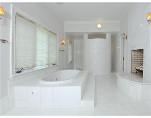 80 Clapboard Ridge Road Greenwich, CT 06830 - Photo 17 of 27 a bathroom with a bathtub and a sink