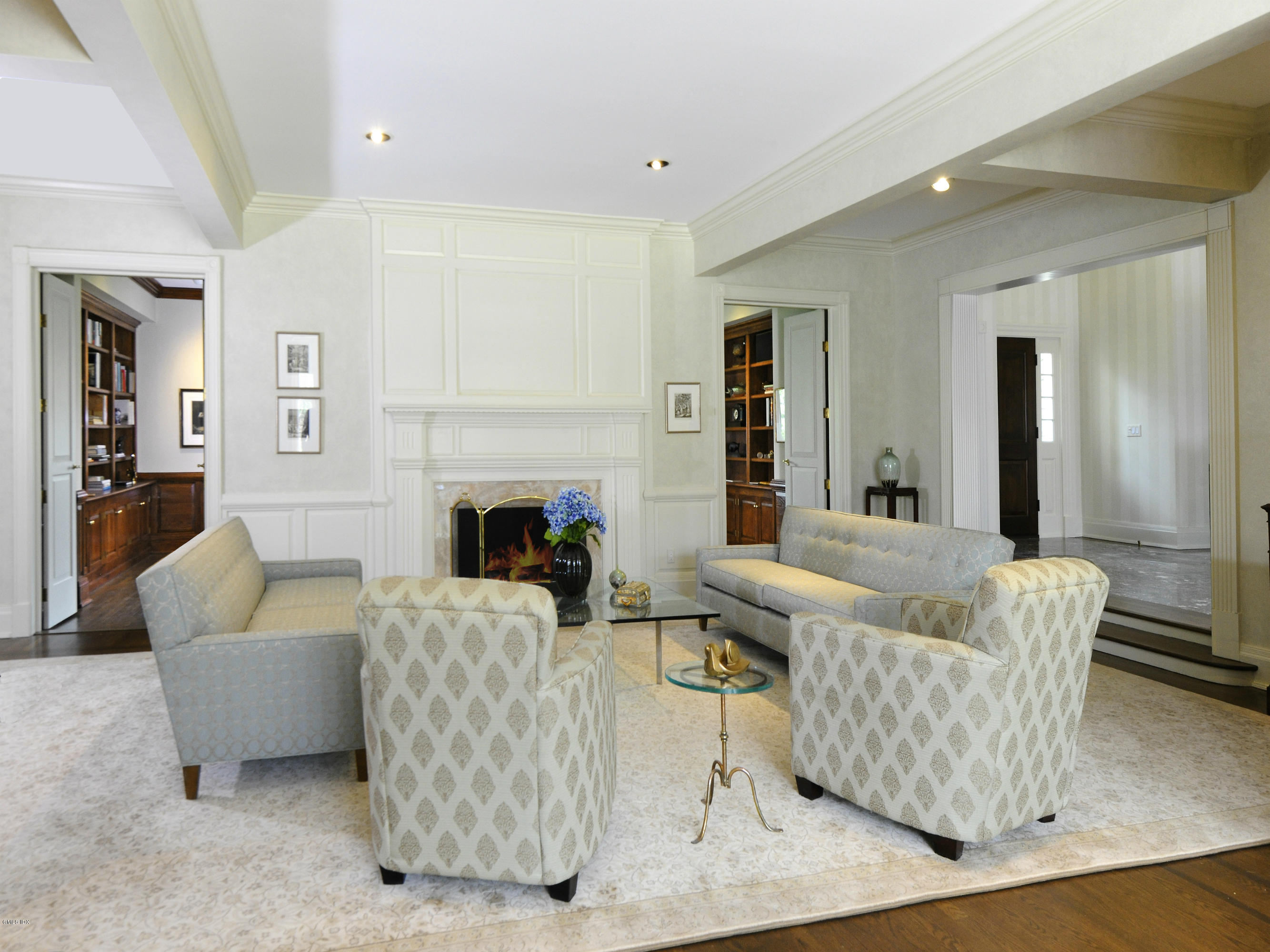 80 Clapboard Ridge Road Greenwich, CT 06830 - Photo 4 of 27 a living room with furniture and a fireplace