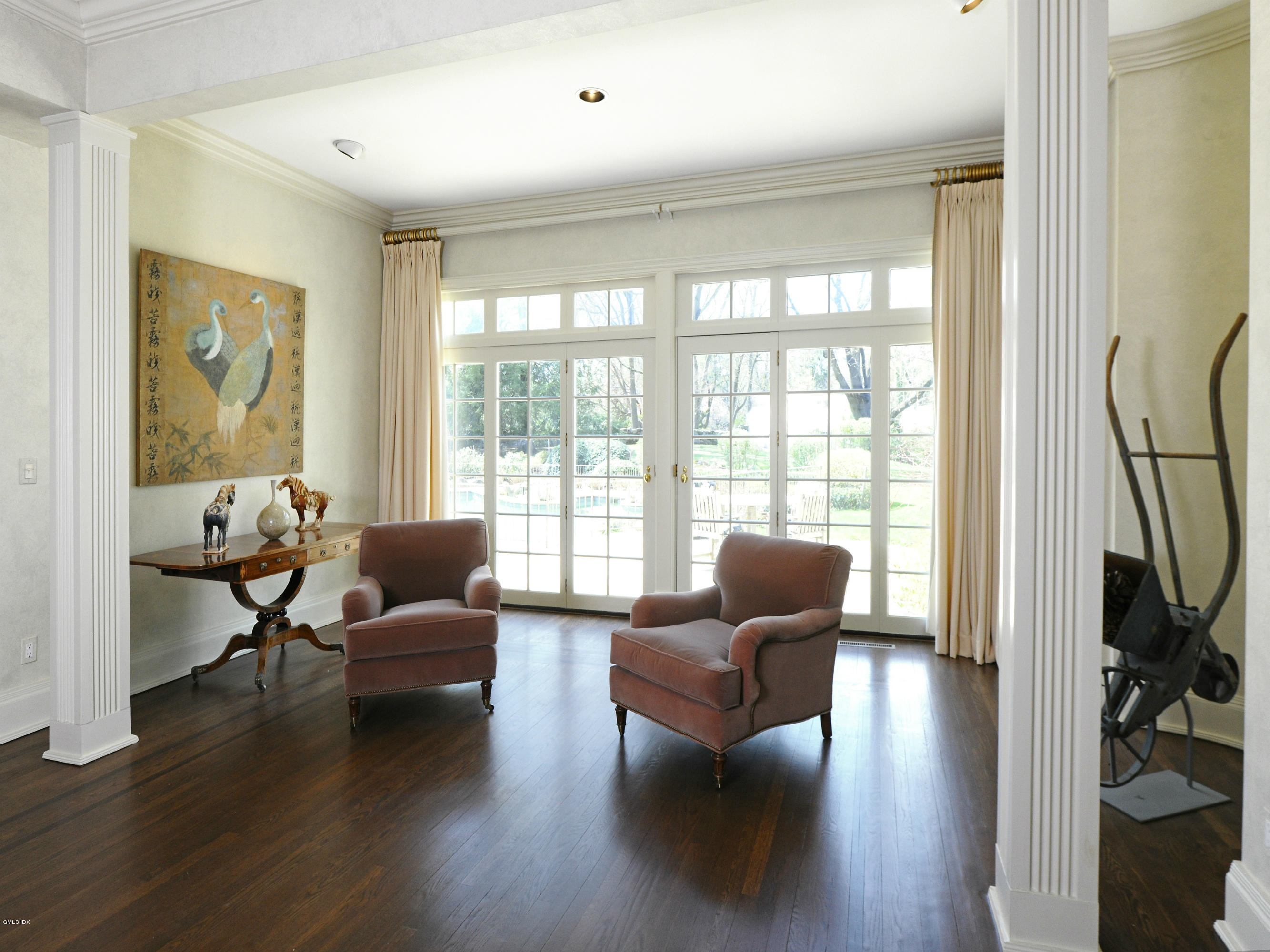 80 Clapboard Ridge Road Greenwich, CT 06830 - Photo 5 of 27 a living room with furniture and a large window