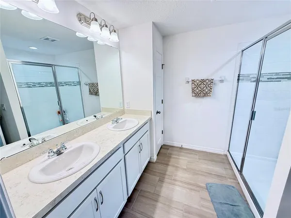 a view of hallway with livingroom and furniture