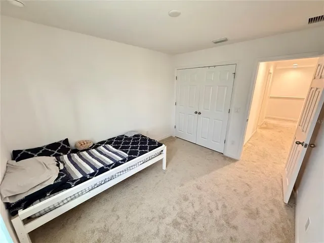 a view of a house with a back yard