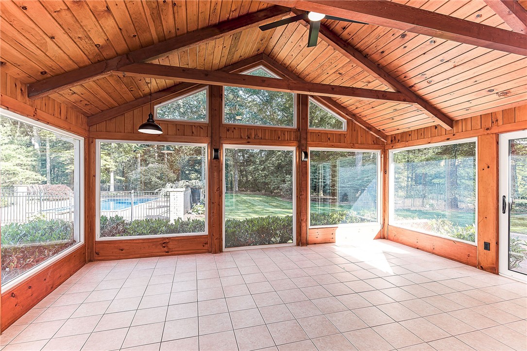 680 Fletcher Road North Kingstown, RI 02852 - Photo 15 of 41 Gorgeous sunroom with sliders to back yard and pool area