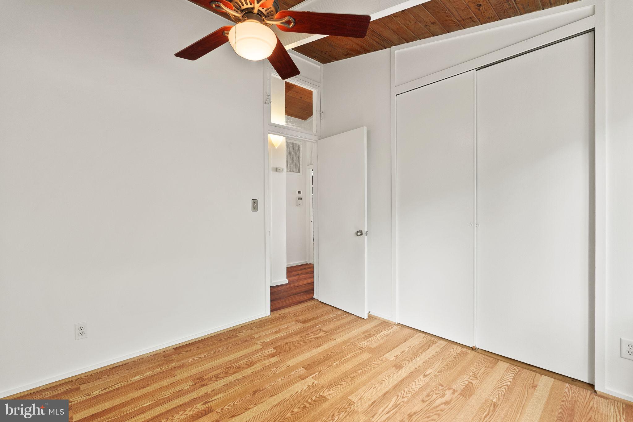 2602 Harris Avenue Silver Spring, MD 20902 - Photo 14 of 25 a view of empty room with wooden floor
