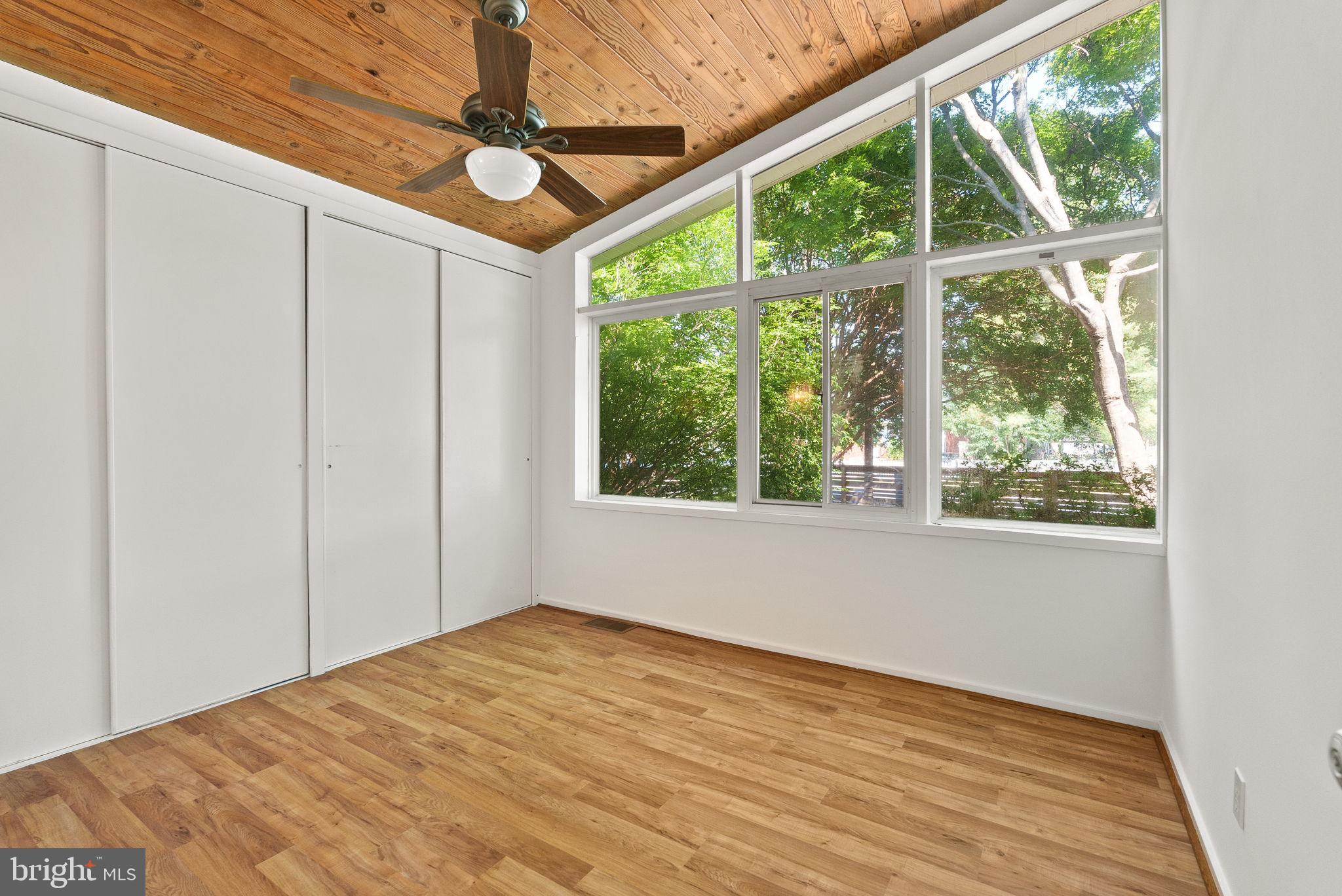 2602 Harris Avenue Silver Spring, MD 20902 - Photo 18 of 25 a view of empty room with wooden floor and fan