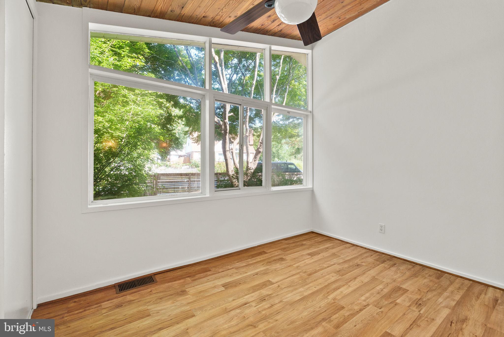 2602 Harris Avenue Silver Spring, MD 20902 - Photo 19 of 25 a view of empty room with wooden floor and fan