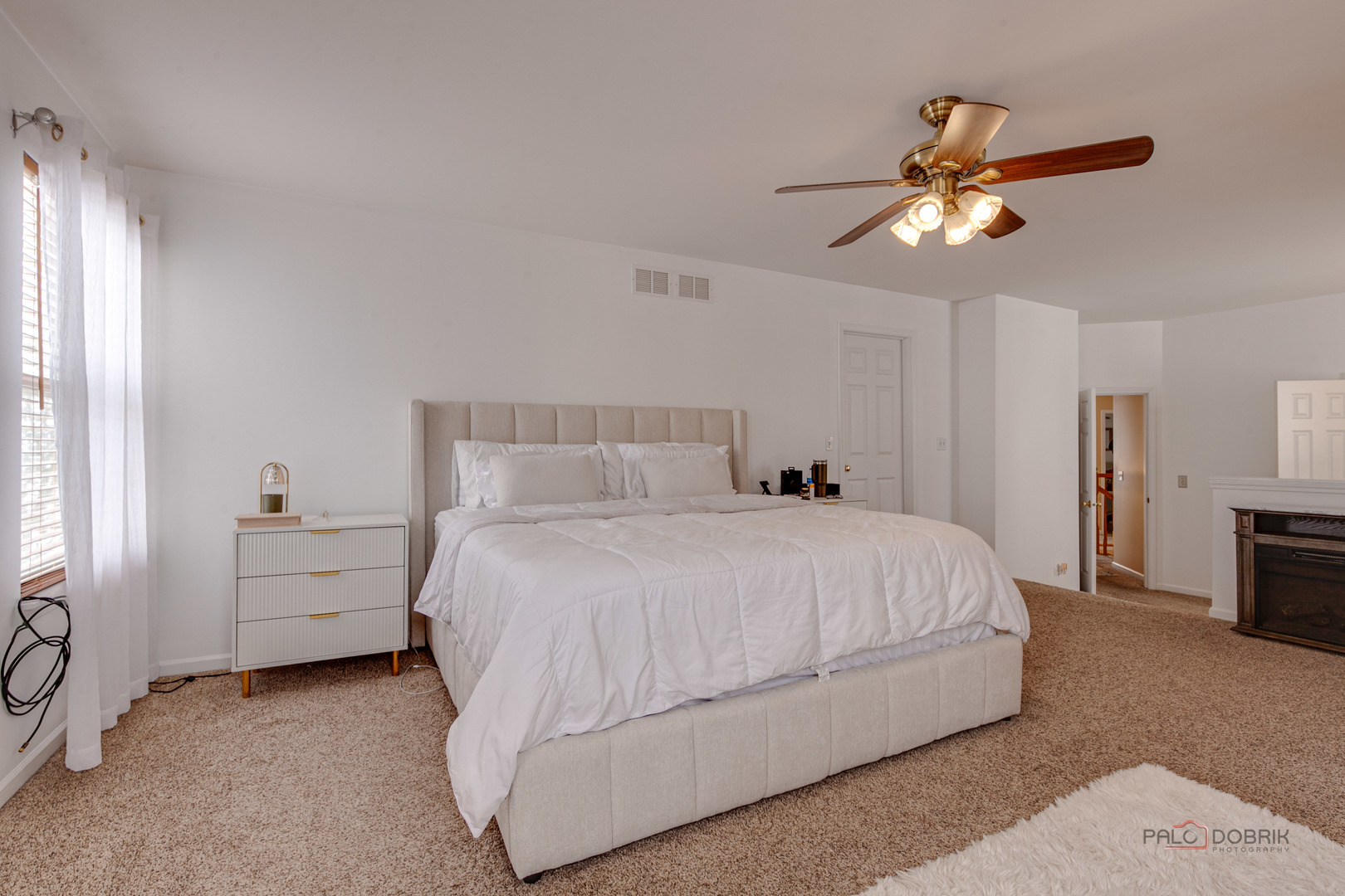 578 North Overlook Trail Round Lake, IL 60073 - Photo 23 of 42 a bedroom with a bed and a chandelier