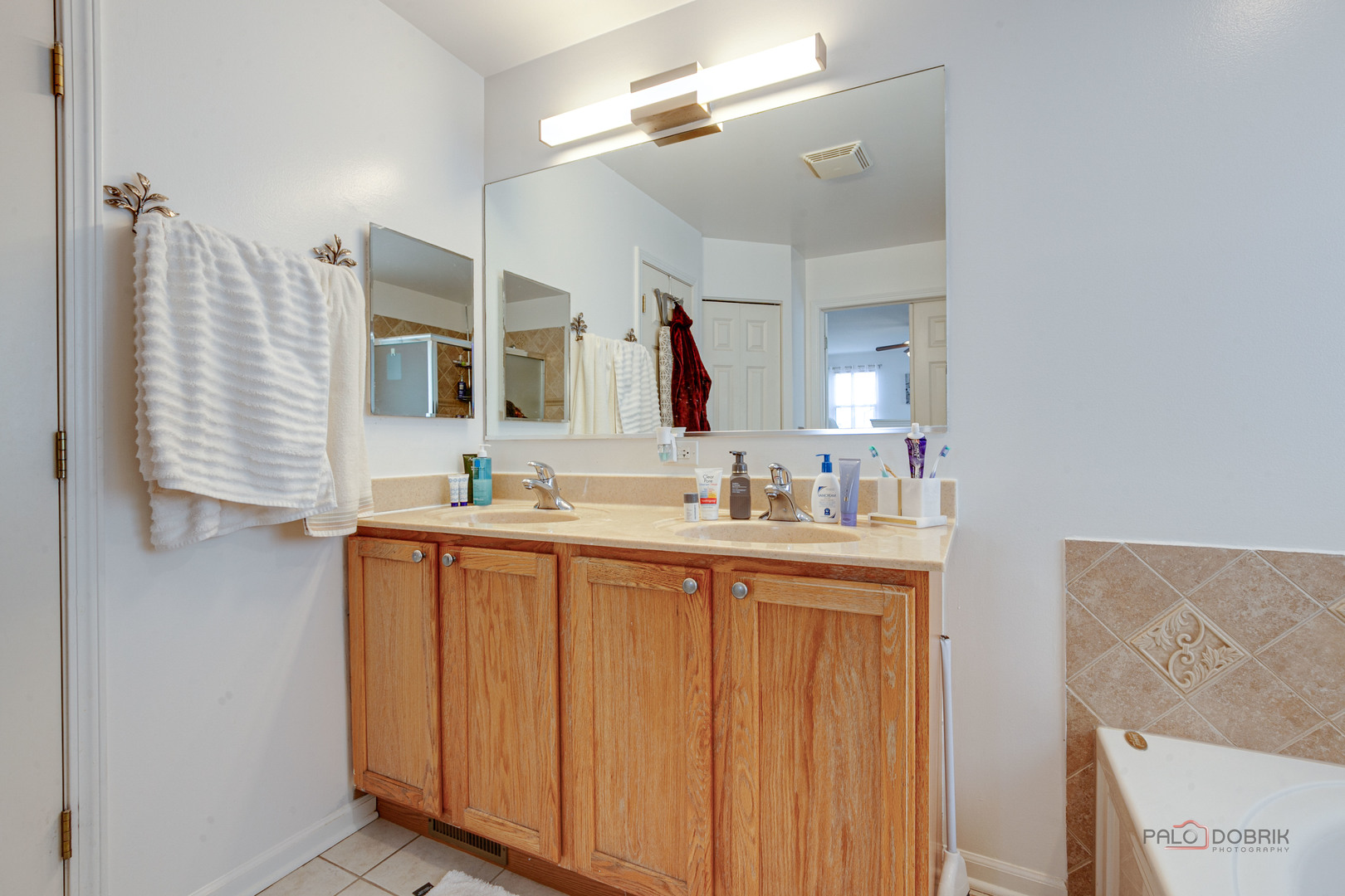 578 North Overlook Trail Round Lake, IL 60073 - Photo 26 of 42 a bathroom with a double vanity sink mirror and double