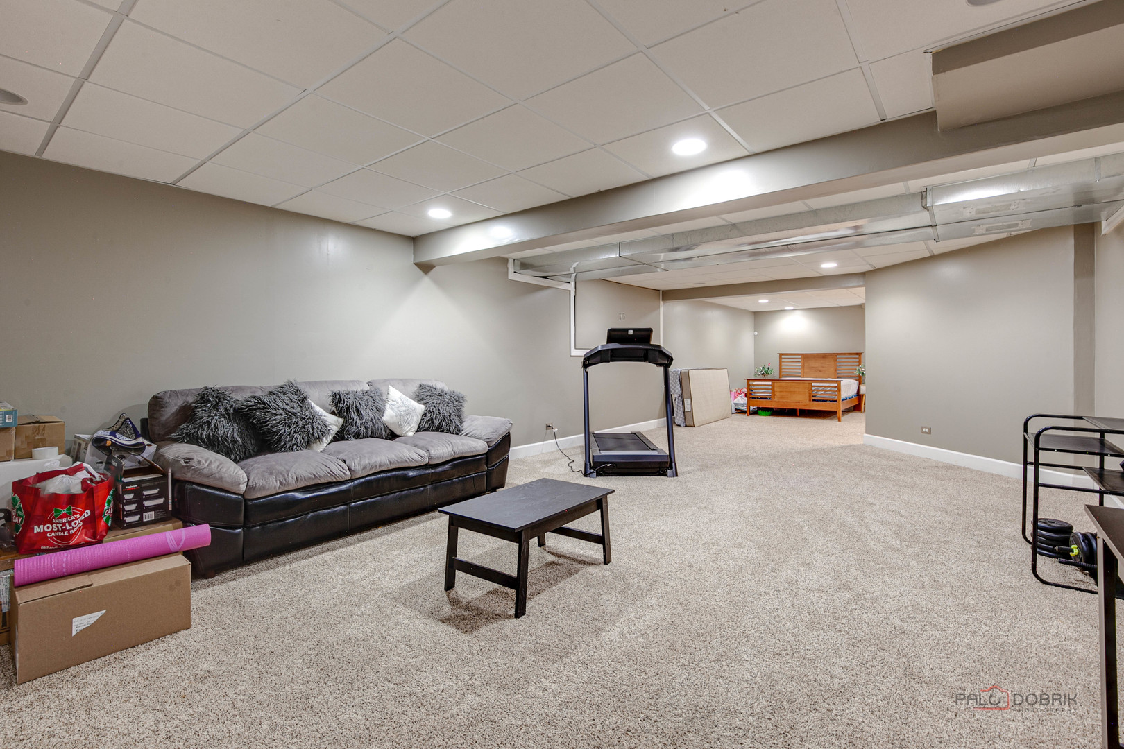 578 North Overlook Trail Round Lake, IL 60073 - Photo 35 of 42 a living room with furniture and a gym machine