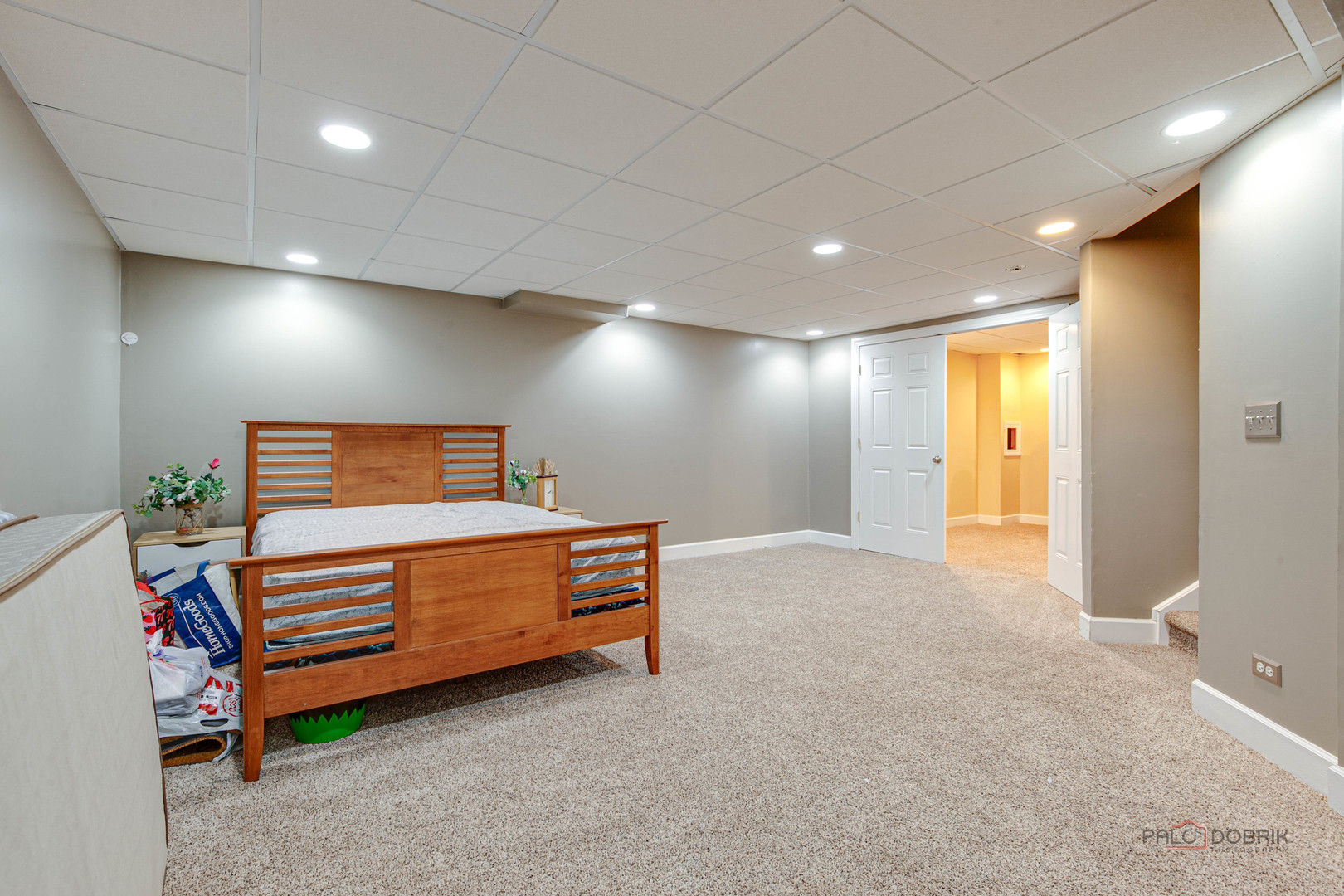 578 North Overlook Trail Round Lake, IL 60073 - Photo 36 of 42 a spacious bedroom with a bed and a lamp