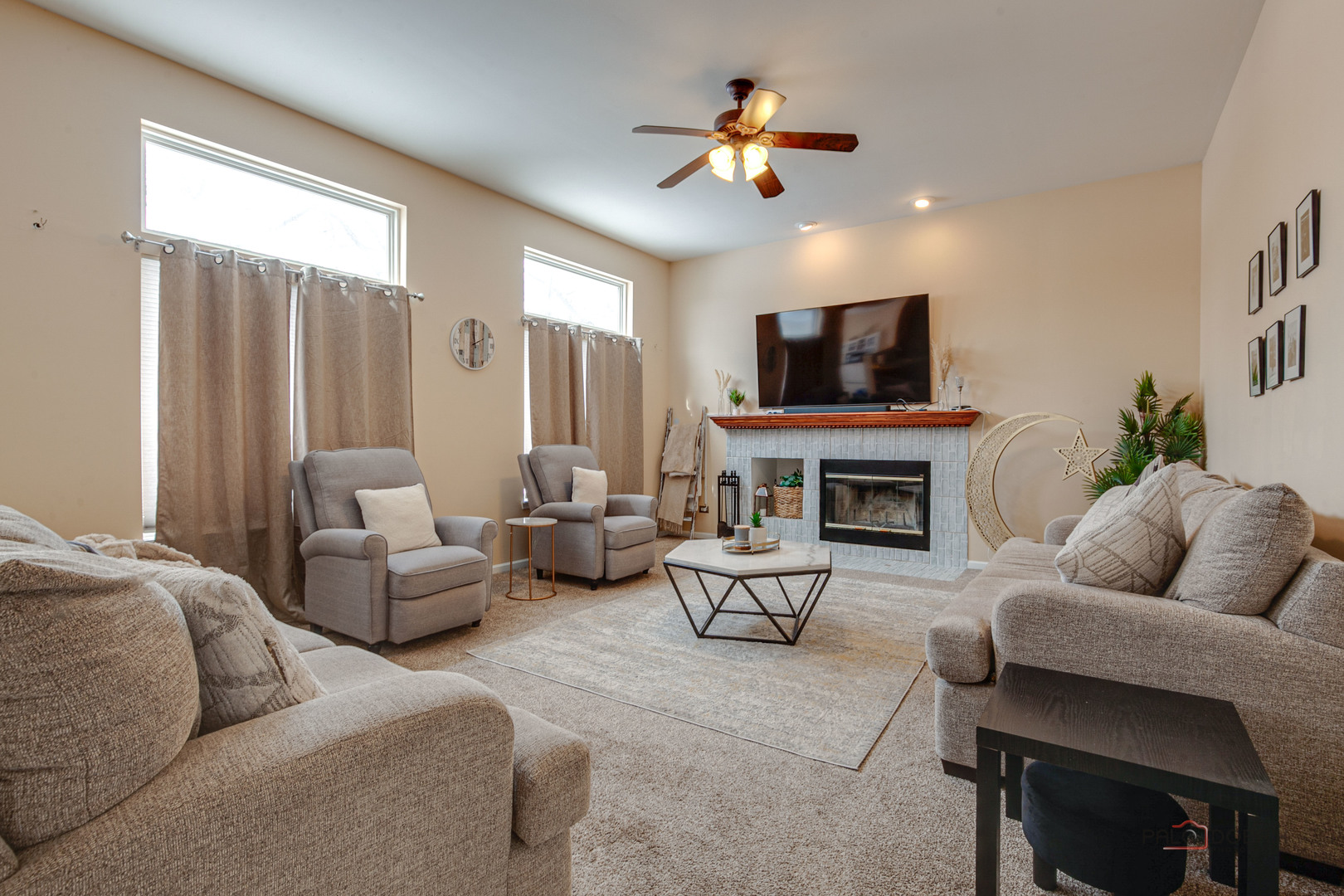 578 North Overlook Trail Round Lake, IL 60073 - Photo 10 of 42 a living room with furniture fireplace and a large window