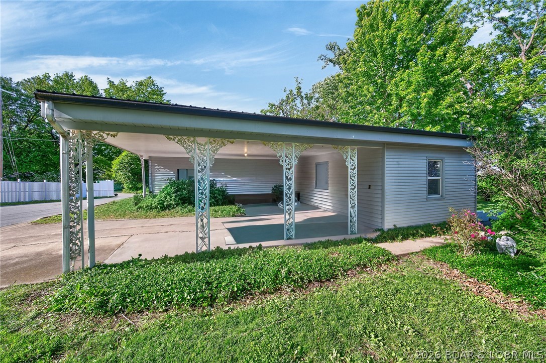 601 East Newton Street Eldon, MO 65026 - Photo 39 of 61 Two car carport/garage with shop.