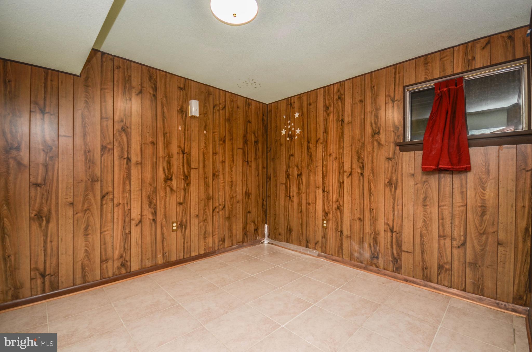 2034 Glen Ross Road Silver Spring, MD 20910 - Photo 30 of 40 a view of a garage with a wooden door
