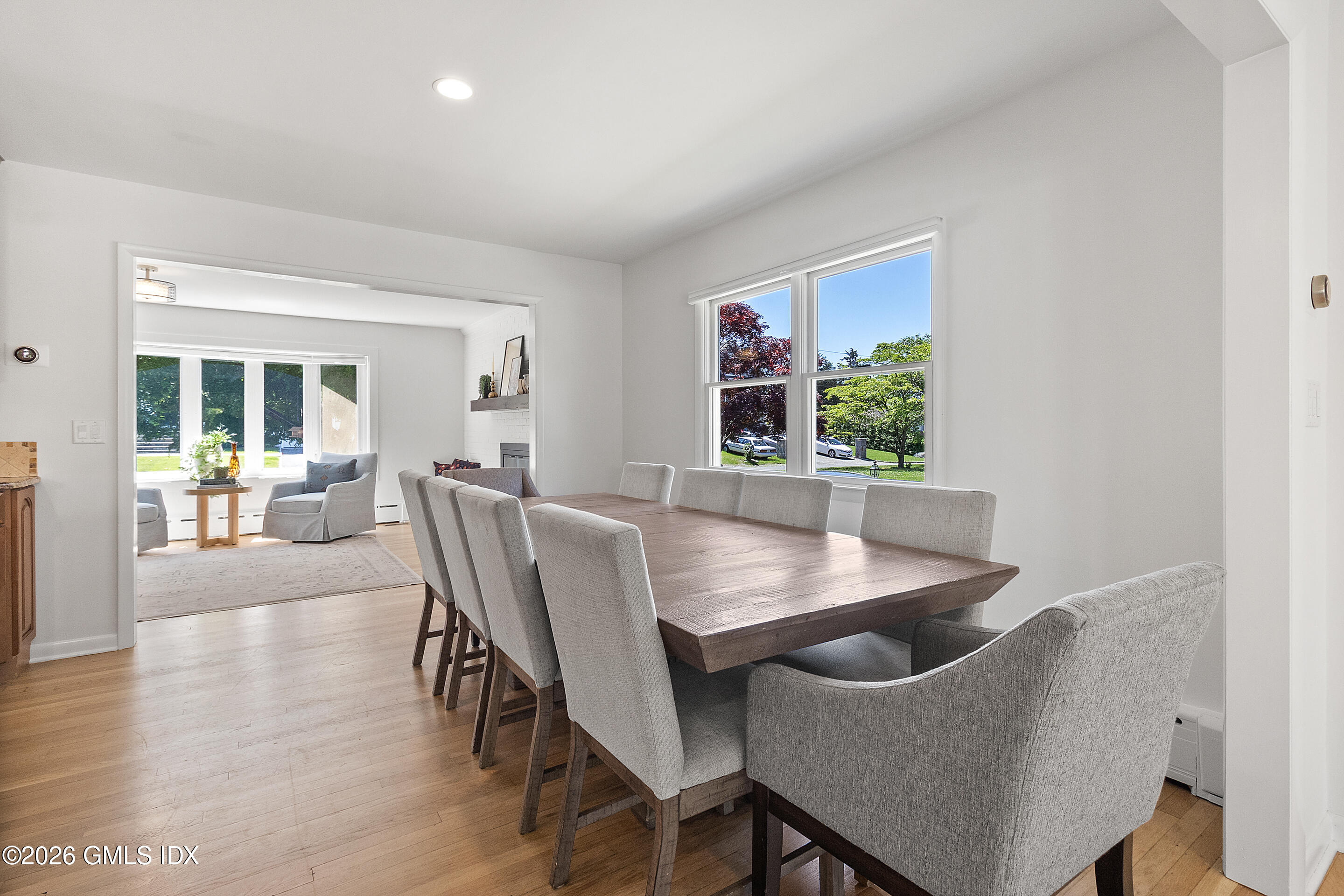 9 Deluca Drive Cos Cob, CT 06807 - Photo 5 of 30 a dining room with furniture and wooden floor