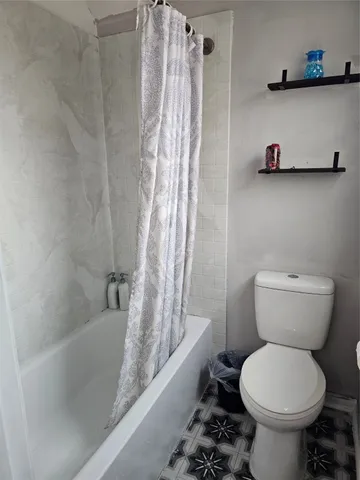 a bathroom with a sink and toilet