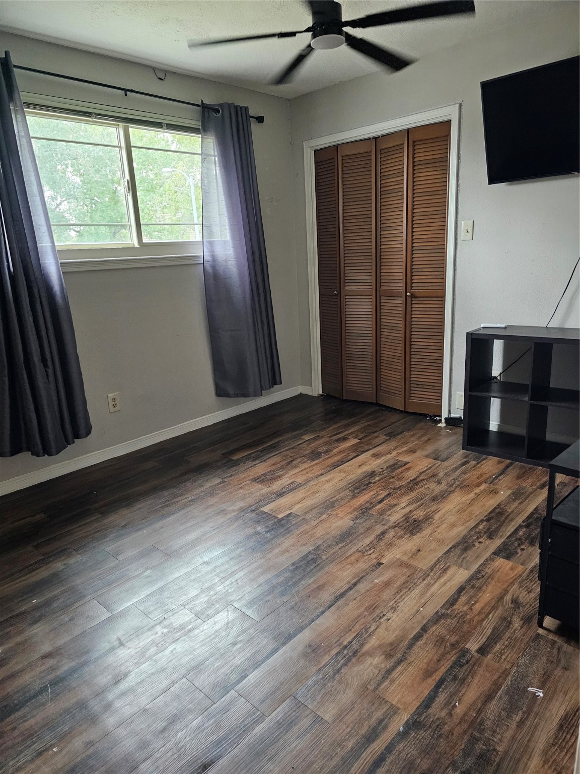 3710 Blue Lake Drive Spring, TX 77388 - Photo 12 of 15 wooden floor in an empty room with a window