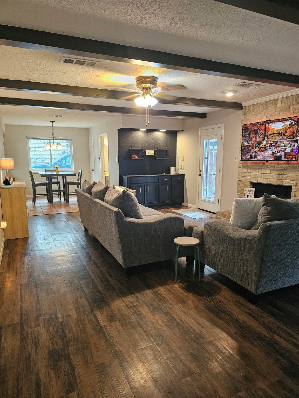 3710 Blue Lake Drive Spring, TX 77388 - Photo 4 of 15 a living room with furniture and a flat screen tv