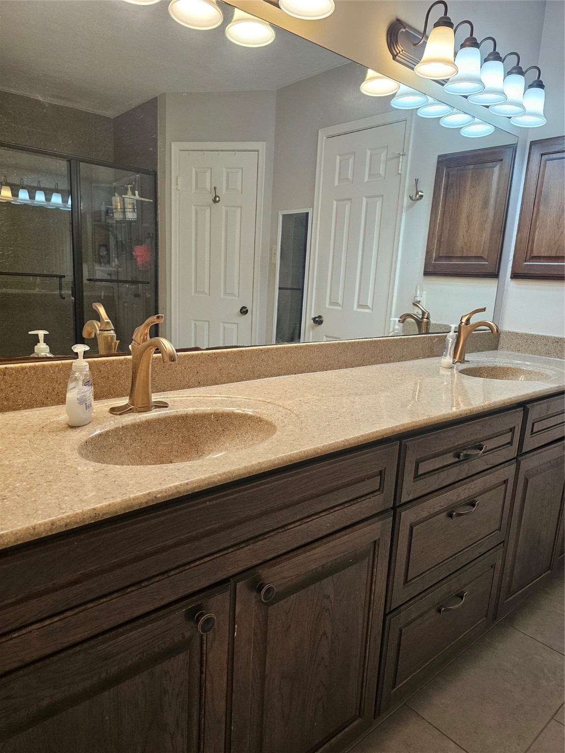 3710 Blue Lake Drive Spring, TX 77388 - Photo 8 of 15 a bathroom with a sink double vanity and a mirror